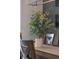 Dining room with wooden table, chairs, and eucalyptus plant at 9102 Sommerset Hills Dr, Davenport, FL 33896