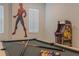 Game room with pool table and arcade game at 9102 Sommerset Hills Dr, Davenport, FL 33896