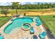 Inviting pool and spa with a beautiful view of the golf course at 735 Golden Bear Dr, Reunion, FL 34747