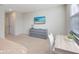 Bedroom with desk, dresser, and wall-mounted TV at 17204 Blessing Dr, Clermont, FL 34714