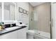 Clean bathroom with a walk-in shower and modern vanity at 17204 Blessing Dr, Clermont, FL 34714