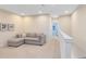 Upstairs loft area with sectional sofa and access to bedrooms at 17204 Blessing Dr, Clermont, FL 34714