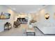 Open concept living area showcasing modern furniture and kitchen at 17204 Blessing Dr, Clermont, FL 34714
