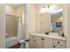 Stylish bathroom with a vanity and a tub at 8063 Knee Deep Rd, Kissimmee, FL 34747