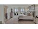Main bedroom with king bed and ensuite bathroom at 4105 Giorgio Dr, Winter Haven, FL 33884