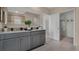 Modern bathroom with double vanity and walk-in closet at 4105 Giorgio Dr, Winter Haven, FL 33884