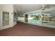 Sunroom overlooking a refreshing swimming pool at 2717 Bayview Dr, Eustis, FL 32726