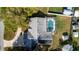 Aerial view showing house, pool, and backyard at 2717 Bayview Dr, Eustis, FL 32726