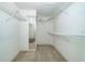 Large walk-in closet with wire shelving and mirror at 2717 Bayview Dr, Eustis, FL 32726