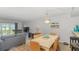 Coastal dining area with ocean view and seating for six at 2100 Ocean Shore Blvd # 203, Ormond Beach, FL 32176