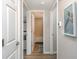 Hallway with bathroom and bedroom access at 2100 Ocean Shore Blvd # 203, Ormond Beach, FL 32176