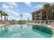 Inviting kidney-shaped pool with ocean view at 2100 Ocean Shore Blvd # 203, Ormond Beach, FL 32176