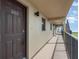Hallway leading to condo unit 203 at 2100 Ocean Shore Blvd # 203, Ormond Beach, FL 32176