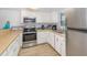 Well-equipped kitchen with stainless steel appliances at 2100 Ocean Shore Blvd # 203, Ormond Beach, FL 32176