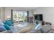 Living room with ocean view and comfy seating at 2100 Ocean Shore Blvd # 203, Ormond Beach, FL 32176
