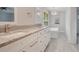 Modern bathroom with double vanity, granite countertops, and a free-standing tub at 235 Oakdale St, Windermere, FL 34786