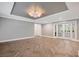Living room with herringbone floors and natural light at 235 Oakdale St, Windermere, FL 34786