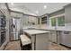 Modern kitchen with stainless steel appliances and an island at 235 Oakdale St, Windermere, FL 34786