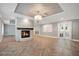 Living room with fireplace and hardwood floors at 235 Oakdale St, Windermere, FL 34786