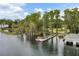 Lakefront property with private dock and beautiful trees at 235 Oakdale St, Windermere, FL 34786