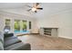Gathering room with pool view and herringbone floors at 235 Oakdale St, Windermere, FL 34786