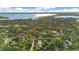 Aerial view showing lake, homes, and green spaces at 235 Oakdale St, Windermere, FL 34786