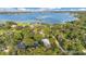 Wide shot of property and surrounding lake community at 235 Oakdale St, Windermere, FL 34786