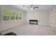 Serene bedroom with ceiling fan and console table at 235 Oakdale St, Windermere, FL 34786