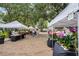 Outdoor farmer's market with various vendors at 235 Oakdale St, Windermere, FL 34786
