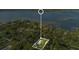 Property location shown with lake view in the background at 235 Oakdale St, Windermere, FL 34786