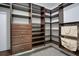 Large walk-in closet with ample shelving and drawers at 235 Oakdale St, Windermere, FL 34786