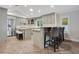 Spacious kitchen with double islands and gray cabinets at 235 Oakdale St, Windermere, FL 34786
