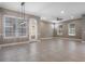 Dining area with tile floors, neutral walls, and access to a patio at 1577 Castile St, Celebration, FL 34747