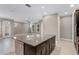 Modern kitchen with granite countertops and dark cabinets at 1577 Castile St, Celebration, FL 34747