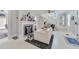 Living room featuring a fireplace and staircase at 424 Pelican Ave, Daytona Beach, FL 32118