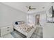 Main bedroom with white shiplap walls and en-suite bathroom at 424 Pelican Ave, Daytona Beach, FL 32118