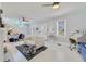 Bright living room with whitewashed floors and comfy seating at 424 Pelican Ave, Daytona Beach, FL 32118