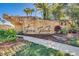 Terra Verde community entrance with stone signage and landscaping at 105 Pompano Beach Dr, Kissimmee, FL 34746