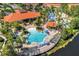 Community pool with surrounding lounge area at 105 Pompano Beach Dr, Kissimmee, FL 34746