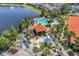 Community pool, playground, and lake access at 105 Pompano Beach Dr, Kissimmee, FL 34746