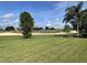 Partial view of backyard and golf course at 34001 Fortunado St, Sorrento, FL 32776