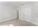 Spacious bedroom with neutral carpeting and ample closet space at 220 Bergamot Loop, Davenport, FL 33837