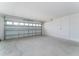 Attached garage with overhead door and ample space at 220 Bergamot Loop, Davenport, FL 33837