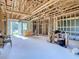 New construction home interior showing framing, electrical, and plumbing at 619 Alafia Pl, Poinciana, FL 34759