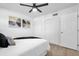 Bedroom with double closets and ceiling fan at 1603 Woodlyn Dr, Leesburg, FL 34748