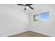 Light and airy bedroom with wood-look floors at 1603 Woodlyn Dr, Leesburg, FL 34748