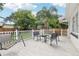 Relax on this deck featuring a seating area and a swing at 1815 Larkin Ave, Orlando, FL 32812