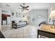 Living area featuring a daybed, desk, and ceiling fan at 1815 Larkin Ave, Orlando, FL 32812