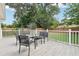Relax on this deck featuring a seating area and a swing at 1815 Larkin Ave, Orlando, FL 32812