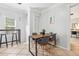 Small dining area with wood table and gray chairs at 1815 Larkin Ave, Orlando, FL 32812
